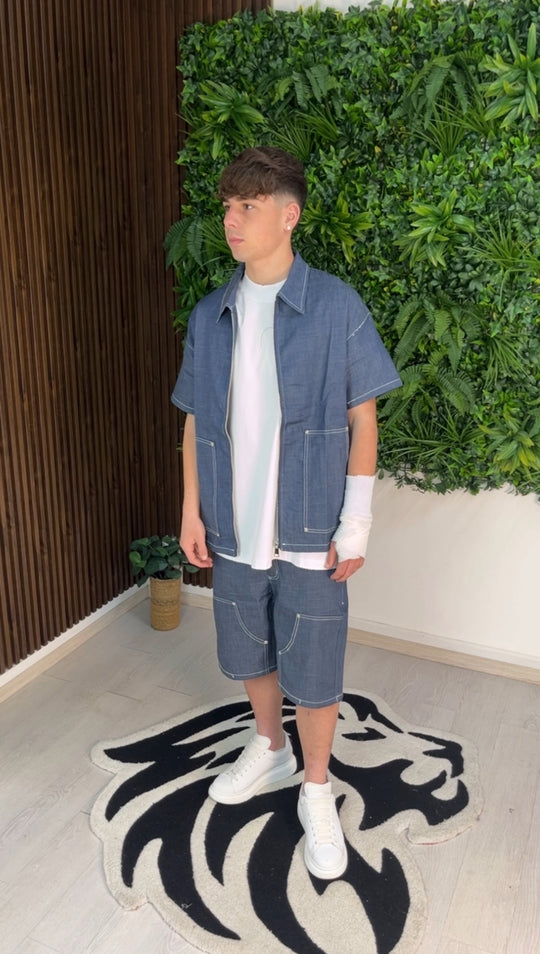 Komplette kurze blaue Denim