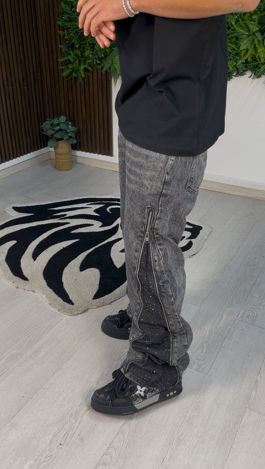 JEANS FLARE CON STRASS