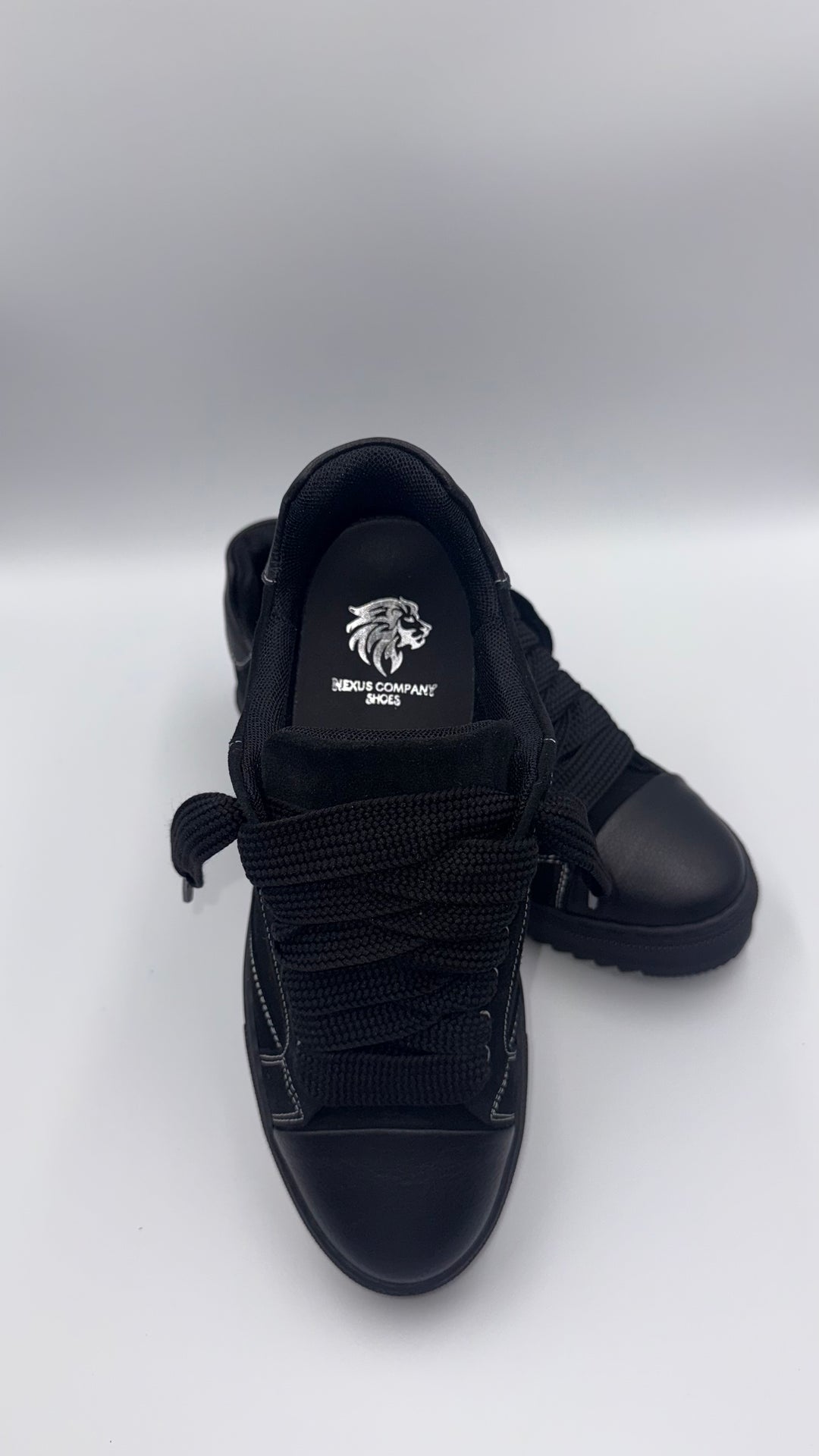 SCARPE NEXUS NERE IN CAMOSCIO