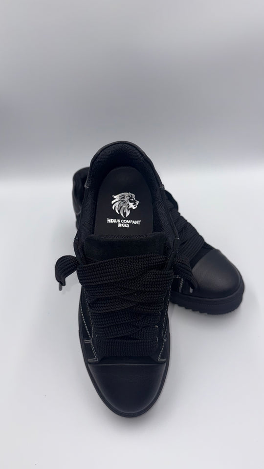 SCARPE NEXUS NERE IN CAMOSCIO