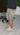 JEANS CORTO BAGGY CROSS